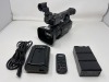 Canon XF105 NTSC HD SSD Camera w/Tripod