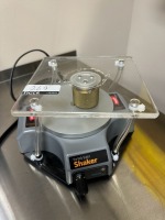The Belly Button Shaker