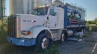 2005 Peterbilt 357 Twin Steer Line Truck