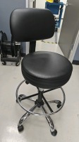 SWIVEL CHAIR W/BACK SUPPORT AND ADJUSTABLE FOOTREST