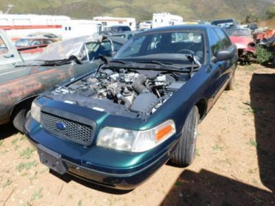 2000 Ford Crown Victoria, VIN- 2FAFP71W3YX213528, V8 Fuel Injected, Auto Trans, Cloth Front Bucket Seats And Vinyl Rear Bench Seat, Factory AC
